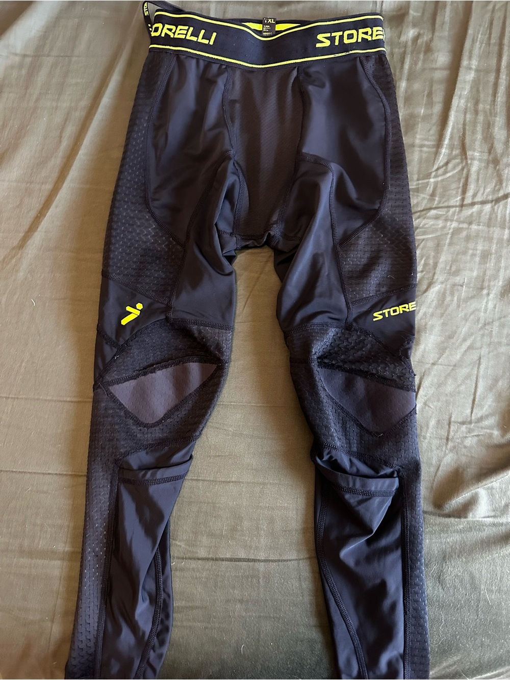 Storelli Kids Black Performance Protective Bottoms with Yellow Accents
